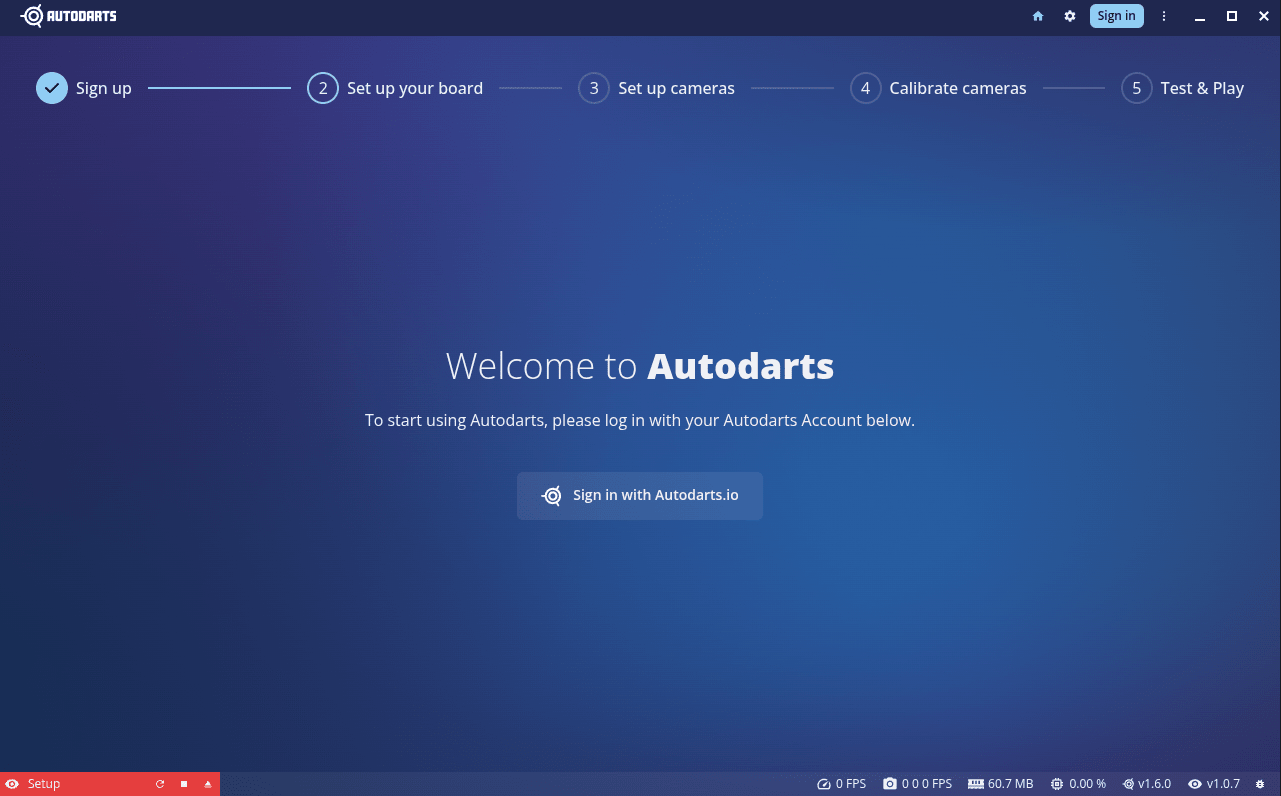 Autodarts Desktop first-startup screen with a 5-step wizard (Sign up, Set up your board, Set up cameras, Calibrate cameras, Test & Play) and a Sign in with Autodarts.io button