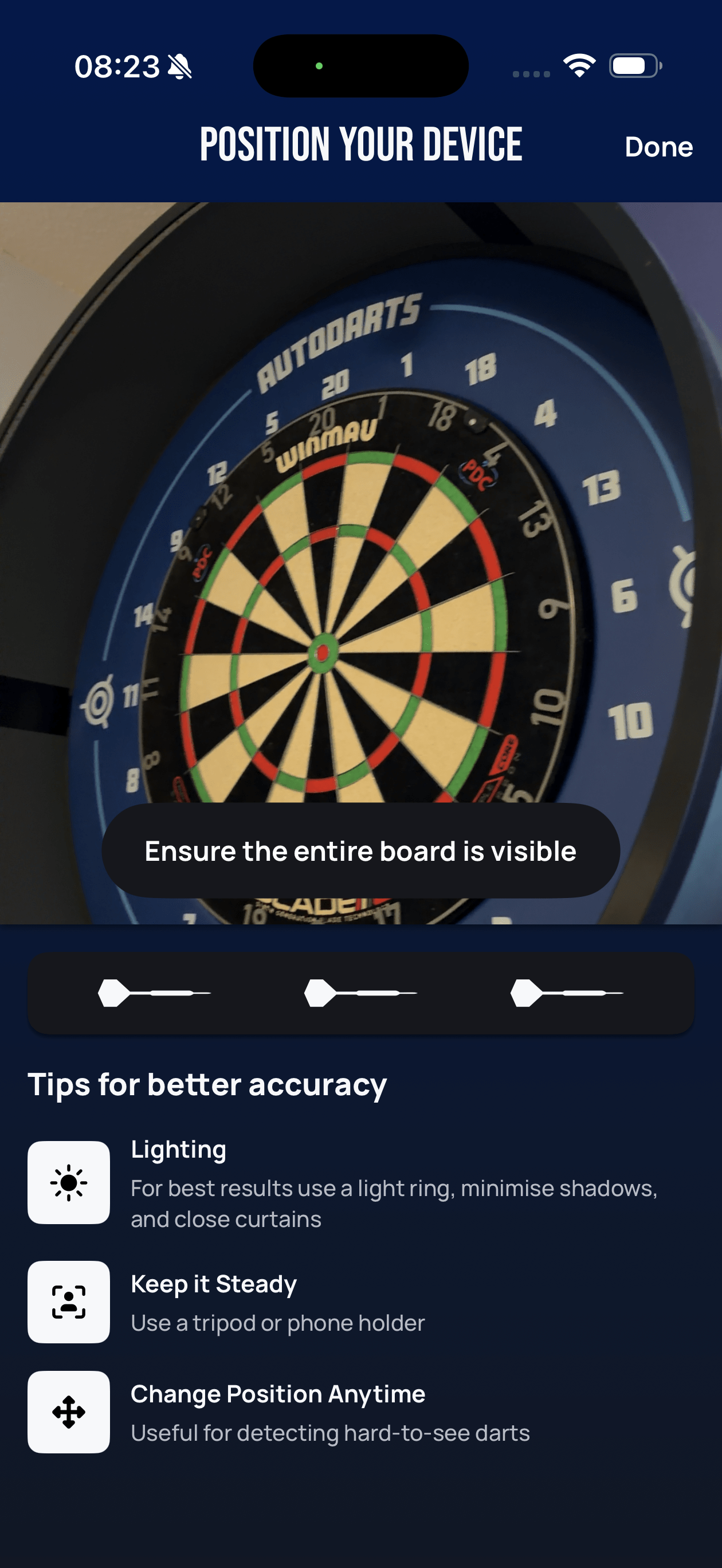 Lens Position your device screen with the message Ensure the entire board is visible, showing a dartboard partly cut off at the bottom of the camera view